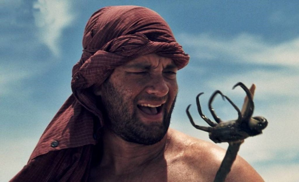 Tom Hanks holding a crab on a stick in the movie Cast Away